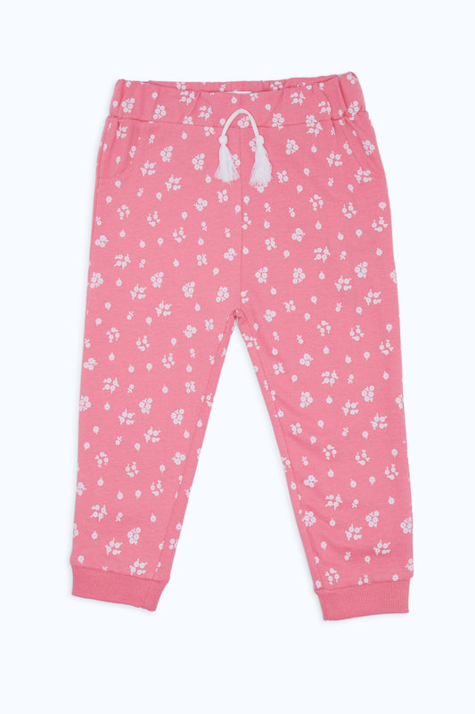 Redtag-Girls-Soft-Pink-Aop-Active-Track-Pant-Category:Joggers,-Colour:Apricot,-Deals:New-In,-Filter:Infant-Girls-(3-to-24-Mths),-H1:KWR,-H2:ING,-H3:SPW,-H4:ATP,-ING-Joggers,-New-In-ING-APL,-Non-Sale,-S23C,-Season:S23C,-Section:Girls-(0-to-14Yrs)-Infant-Girls-3 to 24 Months