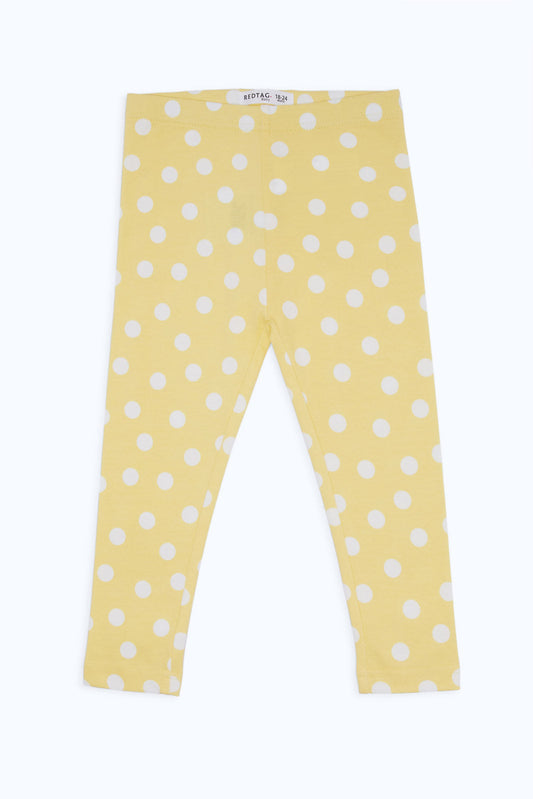 Redtag-Girls-Yellow-Polka-Aop-Legging-Category:Leggings,-Colour:Yellow,-Deals:New-In,-Filter:Infant-Girls-(3-to-24-Mths),-H1:KWR,-H2:ING,-H3:TRS,-H4:LEG,-ING-Leggings,-New-In-ING-APL,-Non-Sale,-S23C,-Season:S23C,-Section:Girls-(0-to-14Yrs)-Infant-Girls-3 to 24 Months